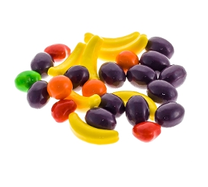 Wonka Runts are willy wonka candy in banana cherry apple orange flavor in purple yellow red and green
