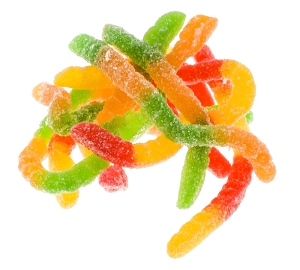 Kervan Sour Worms  are gummy candy in pink yellow red and orange