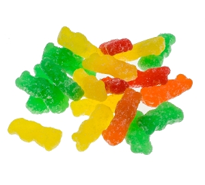 Sour Patch Kids are gummy candy coated in sugar in green yellow red and orange